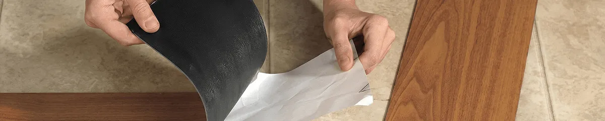 A professional installing vinyl flooring in Marietta, GA